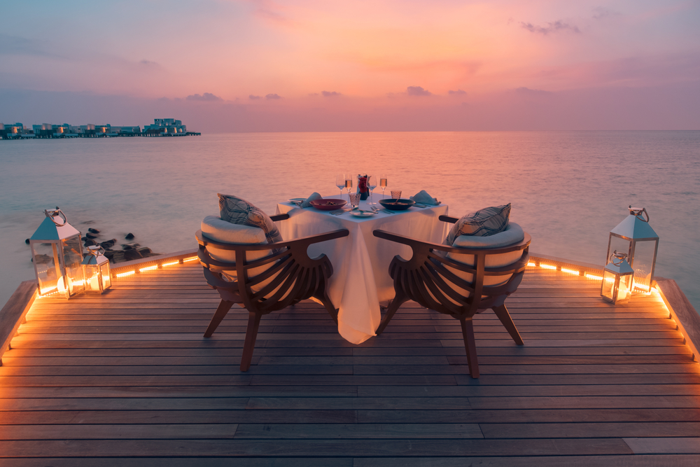 Amazing,Romantic,Dinner,On,The,Beach,On,Wooden,Deck,With